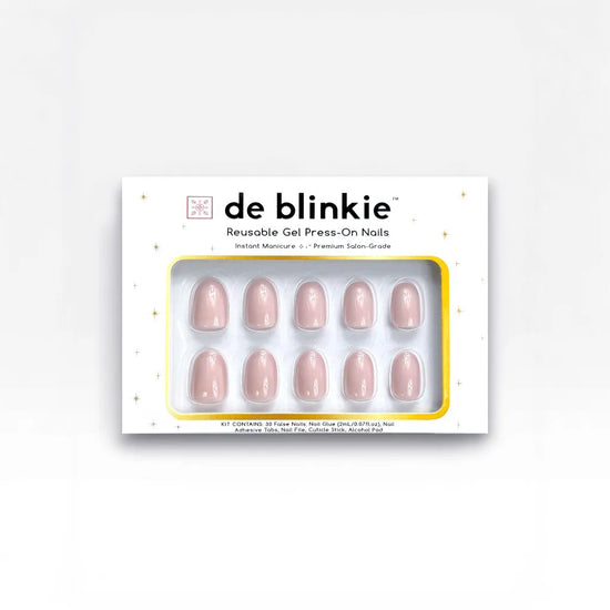Product box shot showing de blinkie Bare Elegance soft pastel pink nude gloss short oval press-on nails against a white background