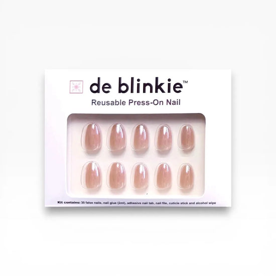 de blinkie Barely Mocha reusable press-on nail kit box showing 10 short oval false nails with rosy mocha nude finish on white tray against white background