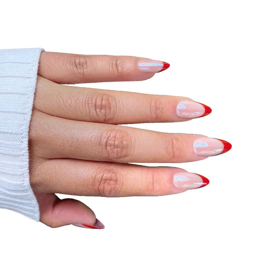 Spread hand showing de blinkie Boss Babe Red sheer nude base with bold crimson red French tip short almond press-on nails, white background