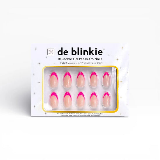 Product box shot of de blinkie Fleur Fuchsia sheer nude base with vivid fuchsia curved French tip reusable gel press-on nails in short almond displayed in white branded packaging with gold star detailing against a white background