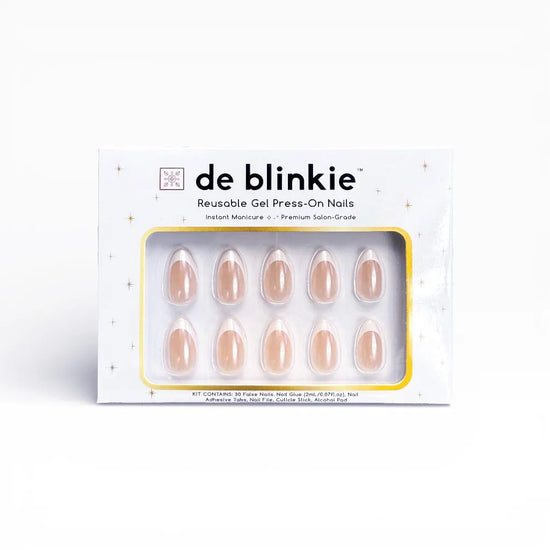 Box shot of de blinkie Ivory Wave reusable gel press-on nails in sheer nude and white French tip short almond against a white background