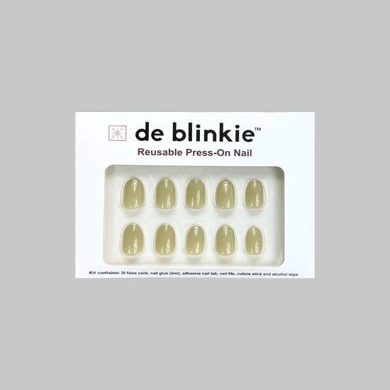 Product box shot of de blinkie Olive Dusk muted olive grey reusable press-on nails displayed in white branded packaging against a light grey background