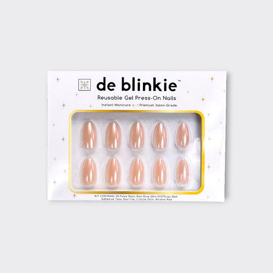 Box shot of de blinkie Peach Pearl reusable gel press-on nails in soft peach nude pearl sheen short almond against a white background
