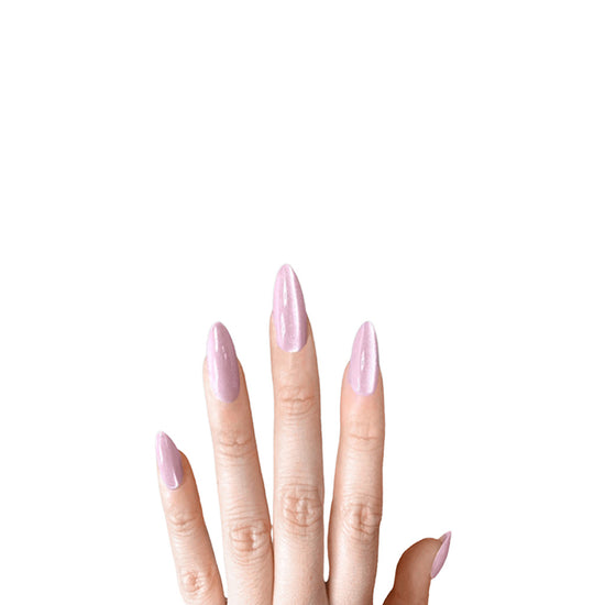 Downward hand pose showing de blinkie Princess Rosée soft lilac pink pearl press-on nails in short almond against a soft neutral background with a white ribbed knit sleeve