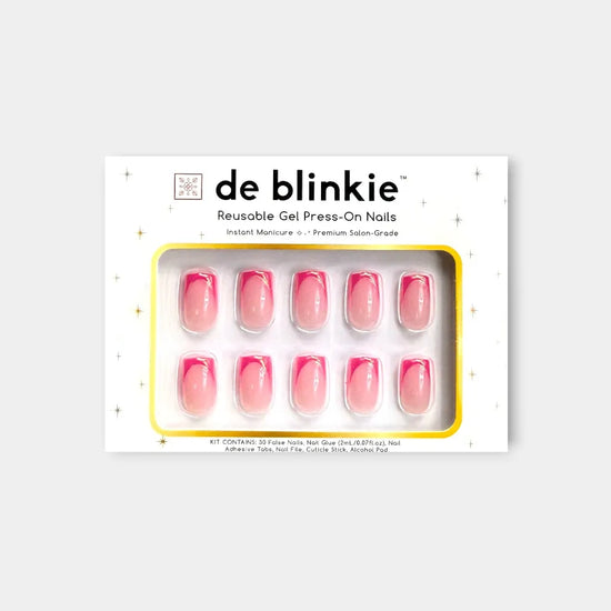 Product box shot showing de blinkie Rosé Mirage sheer blush pink magenta French tip gold trace 3D liner medium square press-on nails against white background