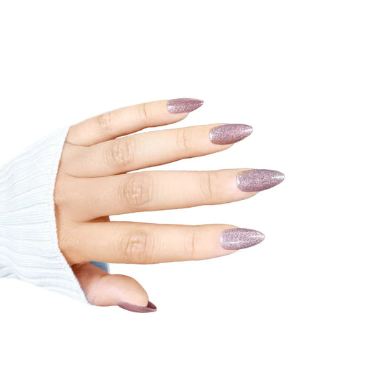 Open claw pose showing de blinkie Starlight Sofia dusty rose pink and silver shimmer short almond false nails, white background