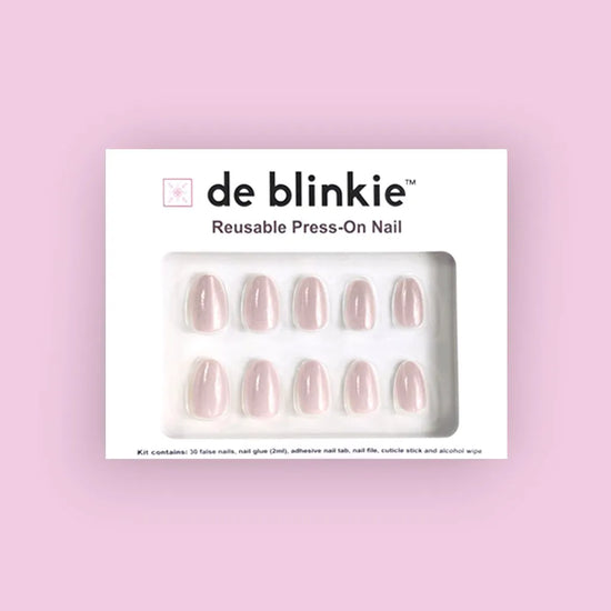 de blinkie Sugar Glaze press-on nail kit box showing 10 short oval false nails with pale lilac blush ultra-fine silver shimmer frosted finish on white tray