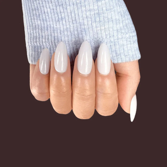 Lady Jane press on nails shown in profile. Cool grey almond shape, high-gloss luxe finish on dark background