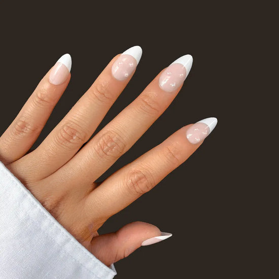 Perle Blanche short almond French tip press on nails in milky white soft blush nude with pearl accents